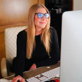 August Brice at her desk working on EMF article