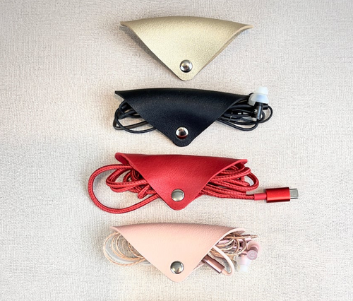Cord Keepers. Pretty, Easy, Elegant Leather Organizers For Headphone and Chargers